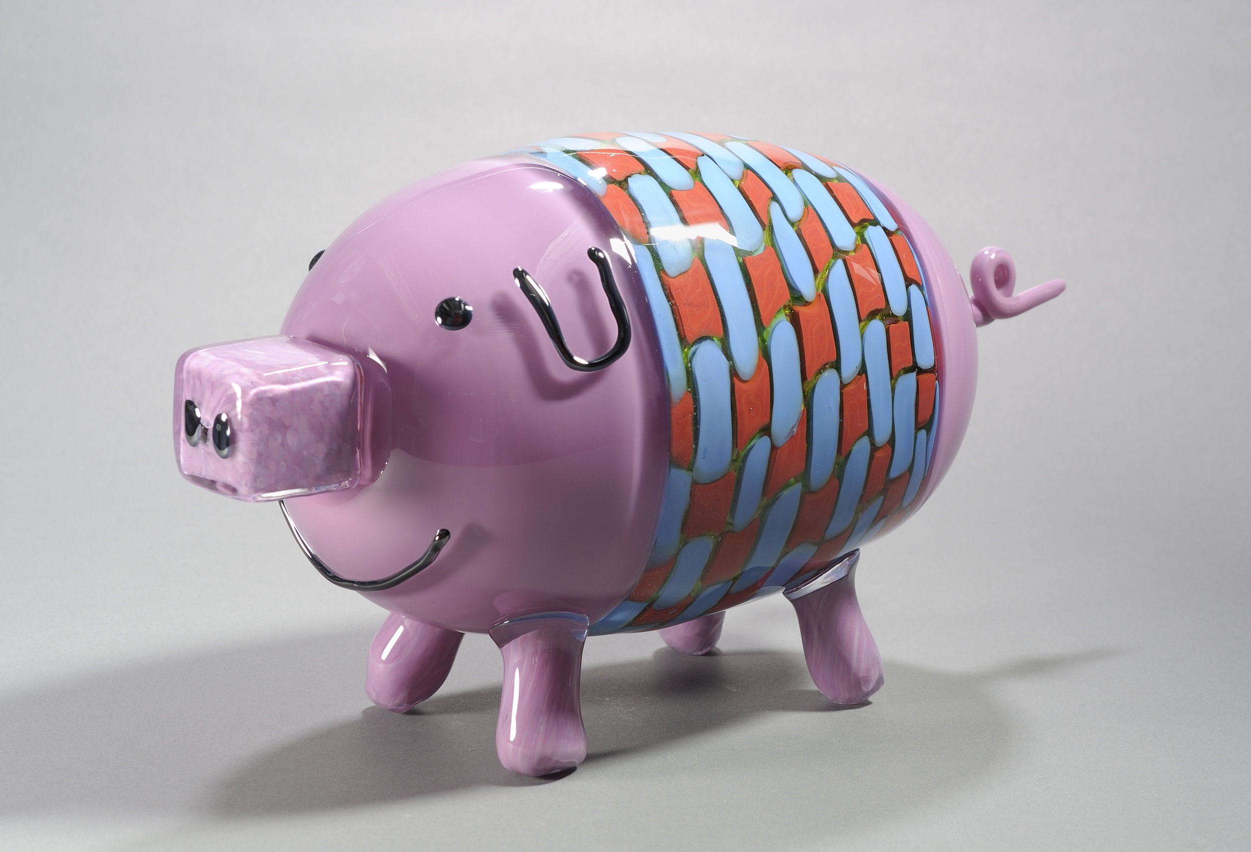  Designed by Forrest Brennan (age 10), made by Museum of Glass Hot Shop Team.&nbsp; Pig in a blanket,  2010.&nbsp;Blown and hot-sculpted glass;&nbsp;8 1/4 x 15 x 6 in.&nbsp;Collection of Museum of Glass, Tacoma, Washington.&nbsp;Photo by Duncan Price